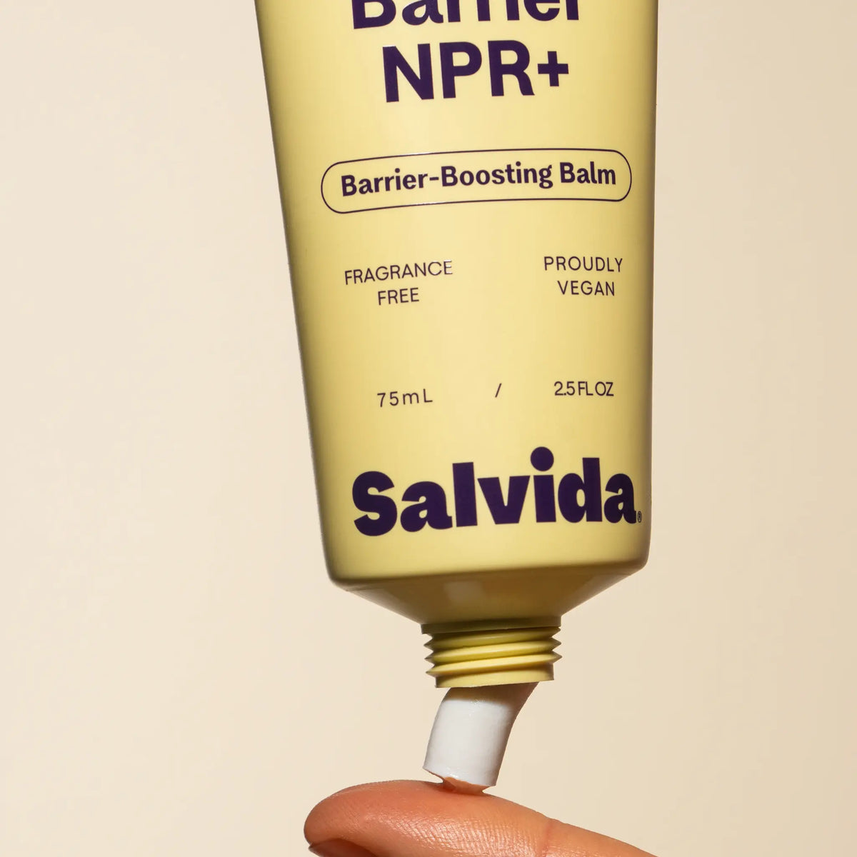 Close-up of a Salvida Barrier NPR+ tube labelled Barrier-Boosting Balm, fragrance free and proudly vegan